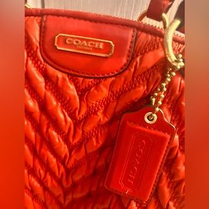 QUILTED CHEVRON COACH. Inside Satin Lining and Zipper Pocket & 2 Slip Pockets.